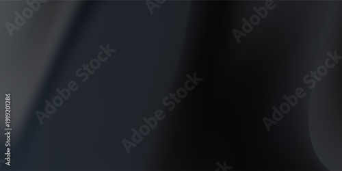 Abstract brushed metal texture with curved light reflections on dark black metallic background.