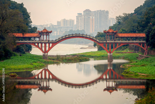 Haoshang Bridge in Mount Emei Scenic Area in Leshan, Sichuan, China. The landmark Haoshang Bridge over the mahao river Leshan, China. Famous places of Leshan.