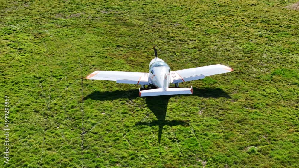 4K drone footage filmed from elevated rear perspective showing a two ...