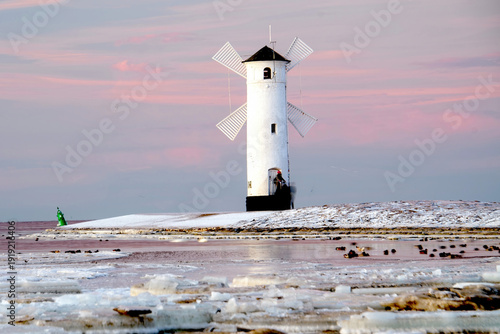 Wallpaper Mural Stawa Młyny Beacon in Swinoujscie During Frozen Winter on the Baltic Sea Torontodigital.ca