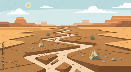 Arid canyon landscape with a winding dry riverbed under a vast blue sky and scattered clouds