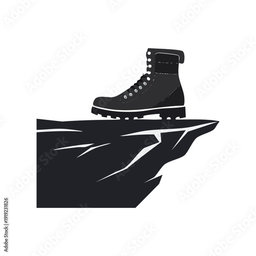 A durable hiking boot stands on the precarious edge of a jagged cliff, symbolizing outdoor adventure, challenging journeys, and the spirit of exploration