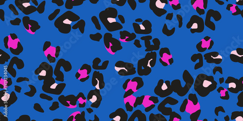 Seamless vector leopard pattern in bold black with vivid pink and soft cream spots on a vibrant cobalt blue background.  Perfect for statement fashion, activewear and youthful branding