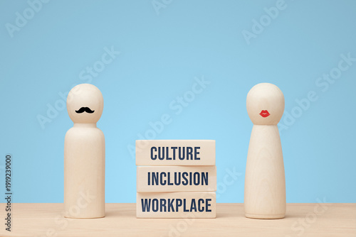 Workplace inclusion concept with wooden figures and blocks