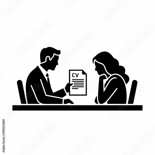 Man and Woman Reviewing Resume Together.