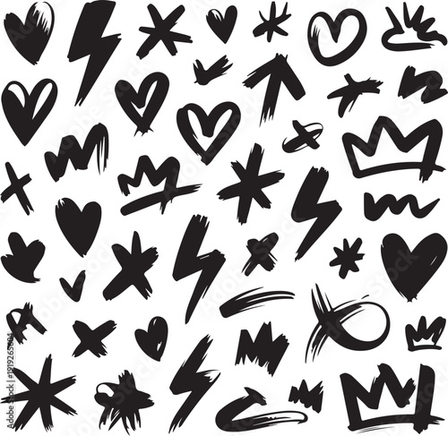 Collection of hand drawn hearts crowns lightning bolts and stars