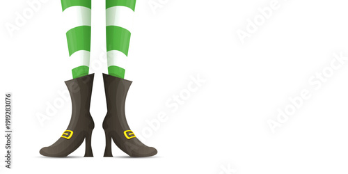 Leprechaun girl legs in green striped stockings and buckled boots, St. Patricks Day horizontal banner with copy space on white background. leprechaun elf s legs wearing green and white striped tights