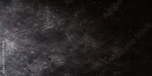 Abstract dark blue and black white grunge texture background featuring an old dirty chalkboard wall surface with a vintage rough paper pattern backdrop