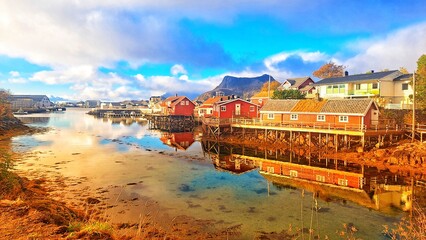 Papier peint photo Lofoten Cabines de Svolvær reflétées sur le fjord  © Connie