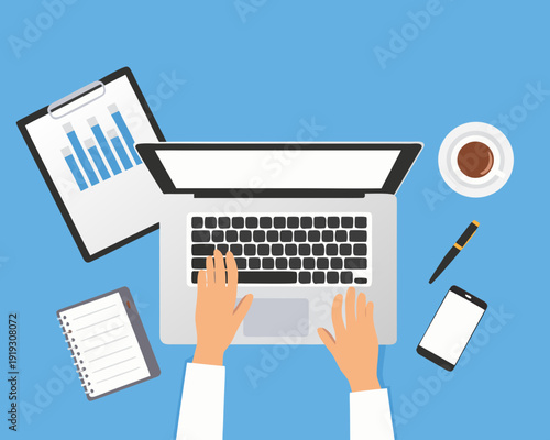 Overhead view of a workspace with laptop notepad and coffee