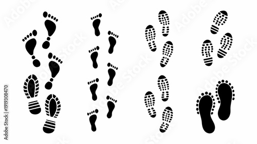 A collection of various black footprints and shoe prints arranged randomly