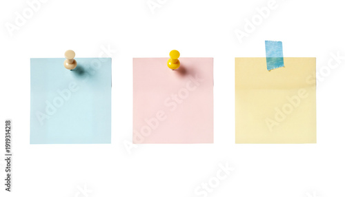 Colorful, business-card-sized notes and cards taped or pinned up
