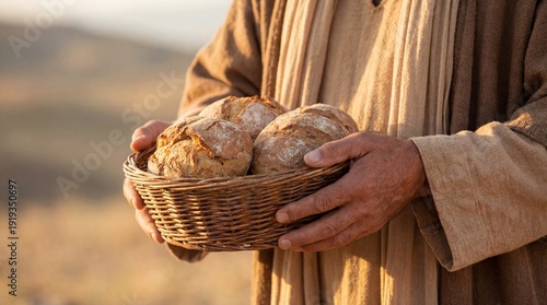 Man with a beard holding a basket with bread. Religious concept of sharing food inspired by Jesus Christ. Christianity, Bible study.