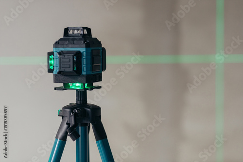 Wallpaper Mural Laser Level Projecting Cross Lines On Wall. Precision Instrument For Alignment And Leveling. Torontodigital.ca