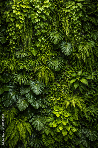 Vertical living wall covered in tropical plants