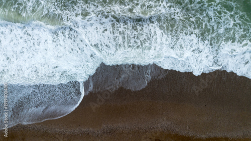 Wallpaper Mural Cinematic drone footage of waves crashing on the shore. Torontodigital.ca