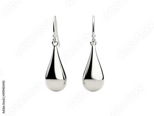 A pair of exquisite silver earrings, delicately crafted with a teardrop design, reflecting light with their polished surface