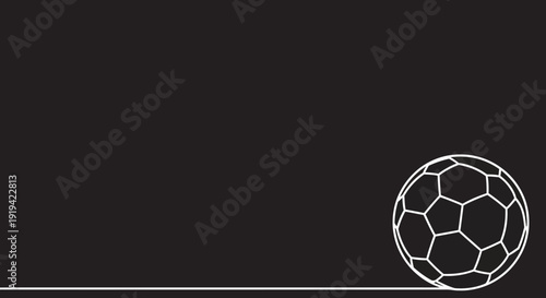 Simple white soccer ball on a black background with ample copy space.
