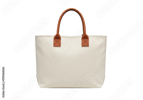 Elegant white canvas tote bag with brown leather handles isolated on transparent background