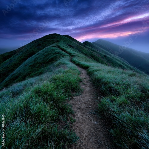 Vibrant twilight over rolling green hills and narrow path