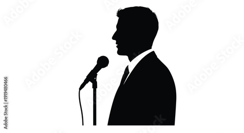 Silhouette of a man in a suit speaking into a microphone against a white background