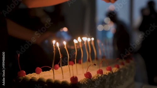 Lighting candles on the cake
