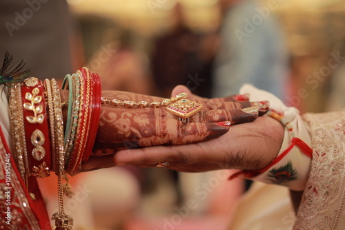 Traditional Indian Wedding Ritual with Bride’s Mehndi Hands