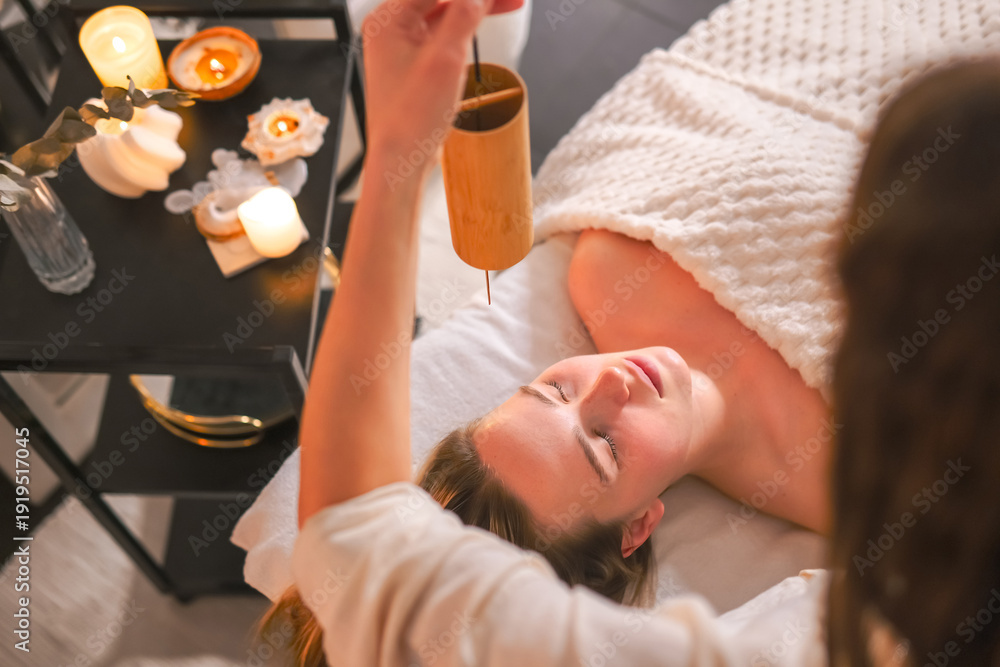 Ταπετσαρία Facial massage and tuning fork sound therapy in candlelit spa, holistic skincare wellness ritual, relaxation and stress relief, self care, energy balance