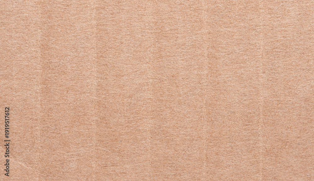 Fototapeta premium Corrugated cardboard, brown textured paper background