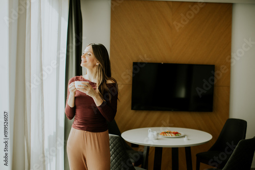 Enjoying morning coffee by ...