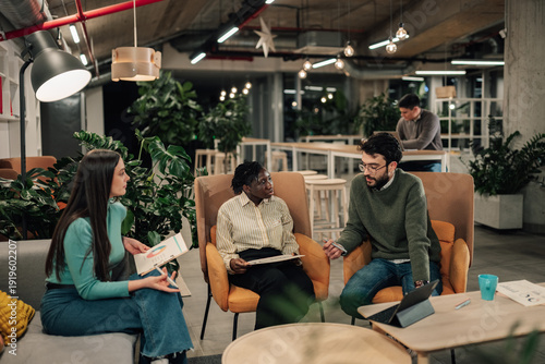 Wallpaper Mural Diverse business team collaborating in modern office lounge Torontodigital.ca