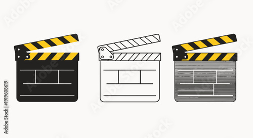 Three film clapboards in black, white, and gray with yellow and black stripes on a plain background.