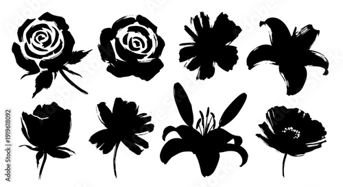 Collection of various black silhouette flowers with a hand-drawn, artistic style.