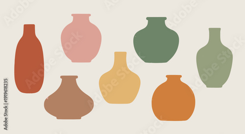 Collection of various minimalist ceramic vases in earthy tones.