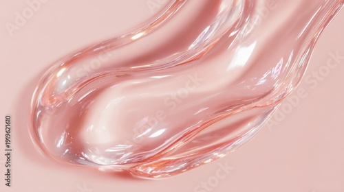 A transparent gel spreads gently across a soft pink surface, highlighting its fluidity and smooth texture. The reflective quality adds depth to the visual appeal, emphasizing a contemporary aesthetic.