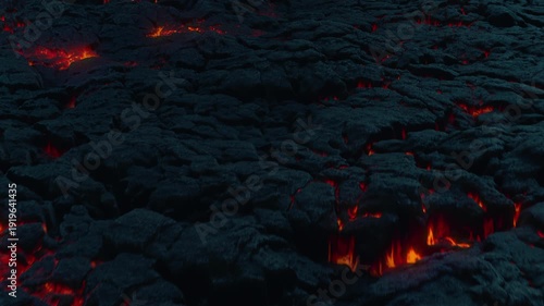 3D Animation of close-up camera drive above a lava surface with glowing magma spots 