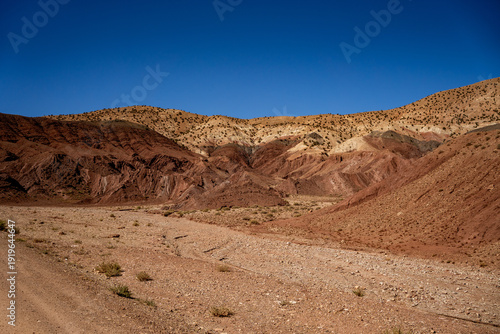 Desert mountain landscape and red rocks in the Ounila Valley, High Atlas, Morocco.