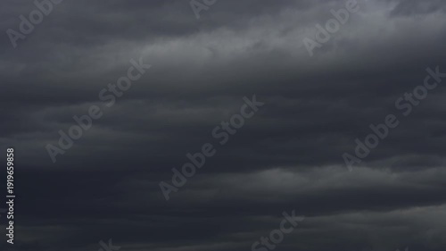 time lapse of dark clouds in the sky