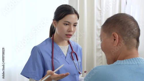 Caregiver, support worker look after senior woman patient, disability at nursing home. Elderly grandmother in wheelchair receiving physical therapy with support from female nurse therapist during the 