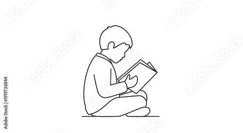 Young Boy Sitting Reading a Book.
