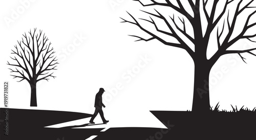 Silhouette of a person walking on a path alone
