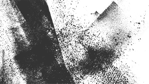 Black speckled spray paint texture on white background with diagonal lines