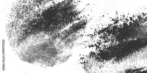 Two dark textured fingerprint patterns on a white background with scattered dark particles black