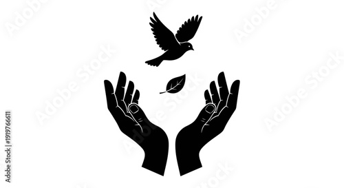 Silhouette of hands releasing a bird and a leaf into freedom.