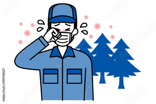 花粉症がつらいつなぎ作業服の男性