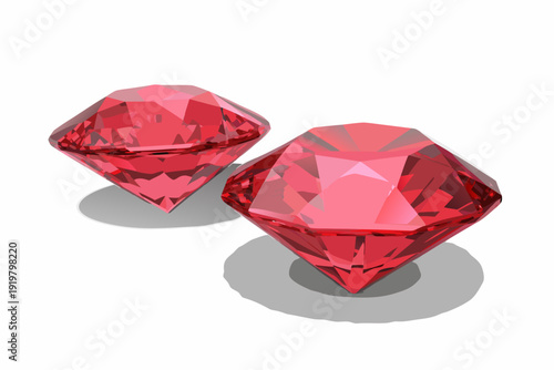 Two polished red diamonds with facets casting soft shadows