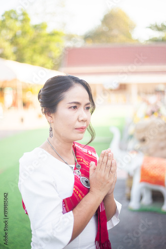 Women in northeastern Thailand wearing traditional costumes on important occasions.