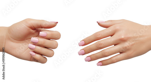 Two female hands with light pink manicured nails reaching towards each other on a white background