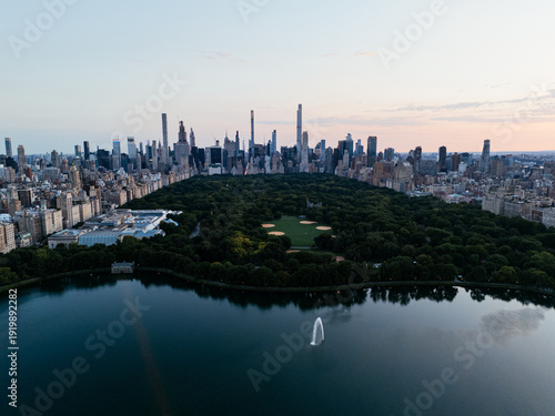 Aerial view of Central Park with Manhattan skyline at dusk, New York City, USA. g.