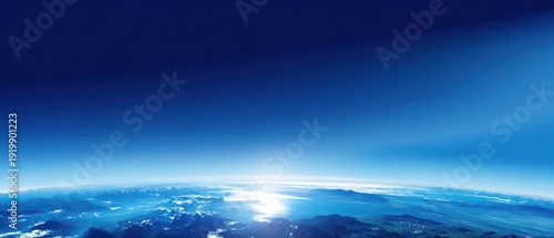 Panel kuchenny z motywem Blue planet curved horizon space backdrop Panoramic view of Earth horizon from space with blue atmosphere and sunlight over clouds